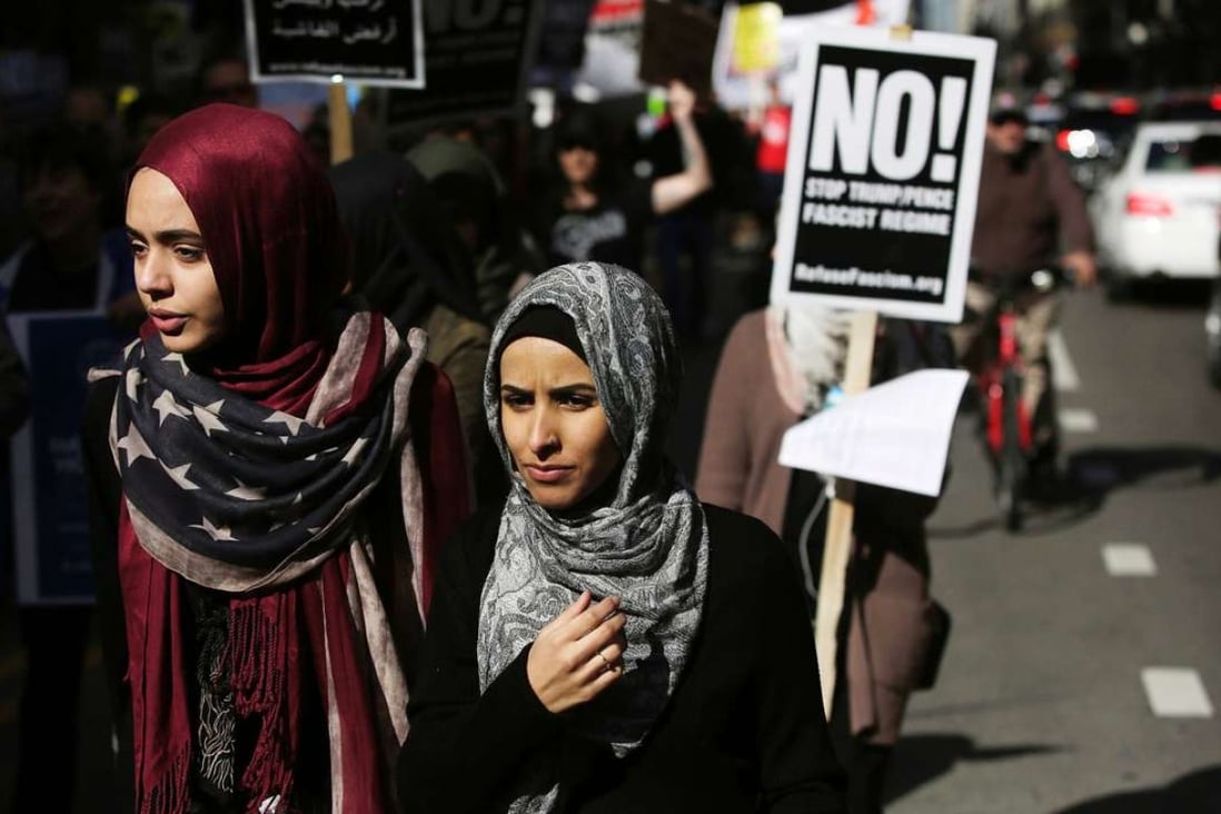Muslim women protest against US President Donald Trump on February 19 in Chicago, Illinois. Anti-Muslim ideologues have for years treated Islam as a non-religion that threatens American life and law through a violent ideology of sharia. Photo: AFP