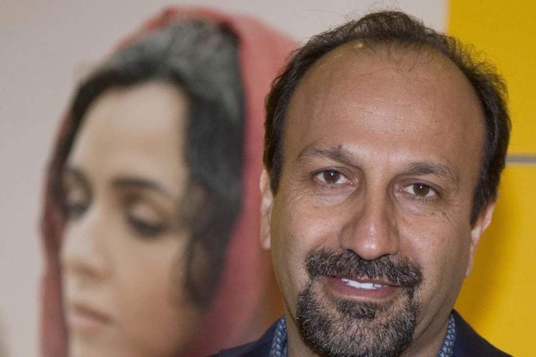 Iranian director Asghar Farhadi poses for a photo during the premiere of his film, "The Salesman, in Paris. Iran's top diplomat has congratulated director Asghar Farhadi for winning the Oscar in the best foreign language category with his film. Photo: AP
