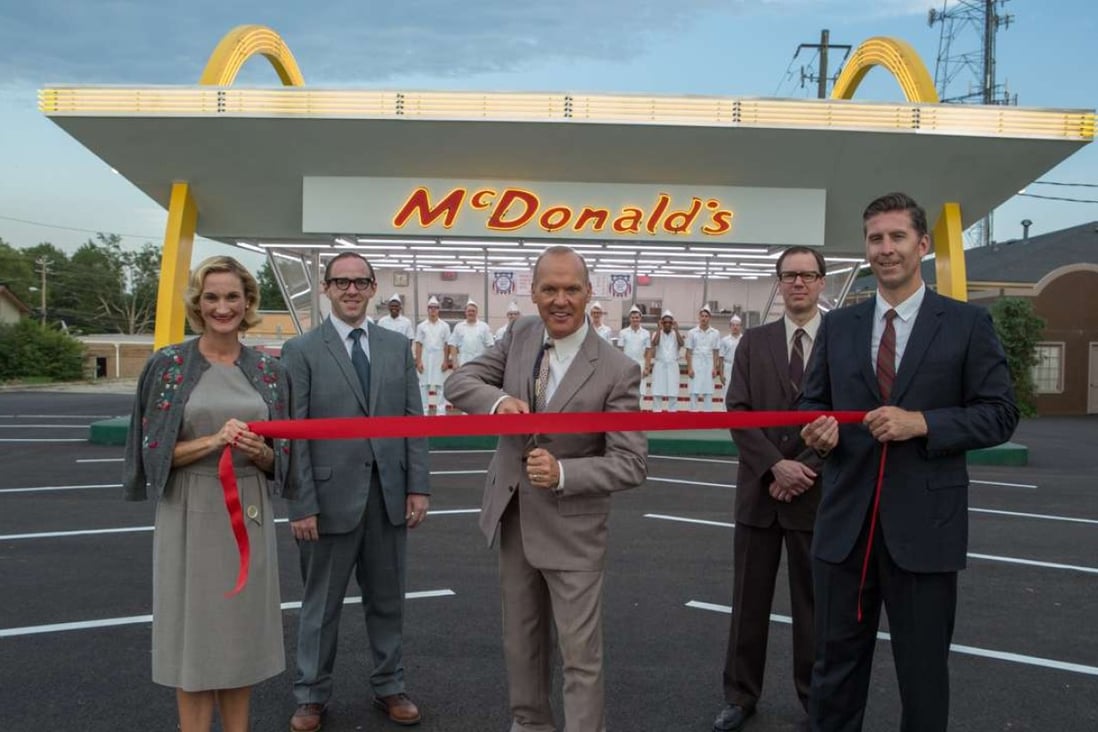 Michael Keaton (middle) as Ray Kroc in the film The Founder (Category: IIA), directed by John Lee Hancock.