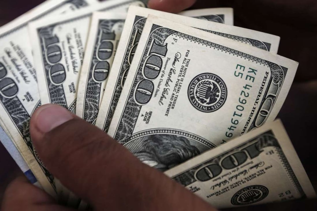 China’s foreign exchange reserves rise unexpectedly in February as government restrictions on capital outflows pushed forex reserves in Beijing back over US$3 trillion. Photo: AFP