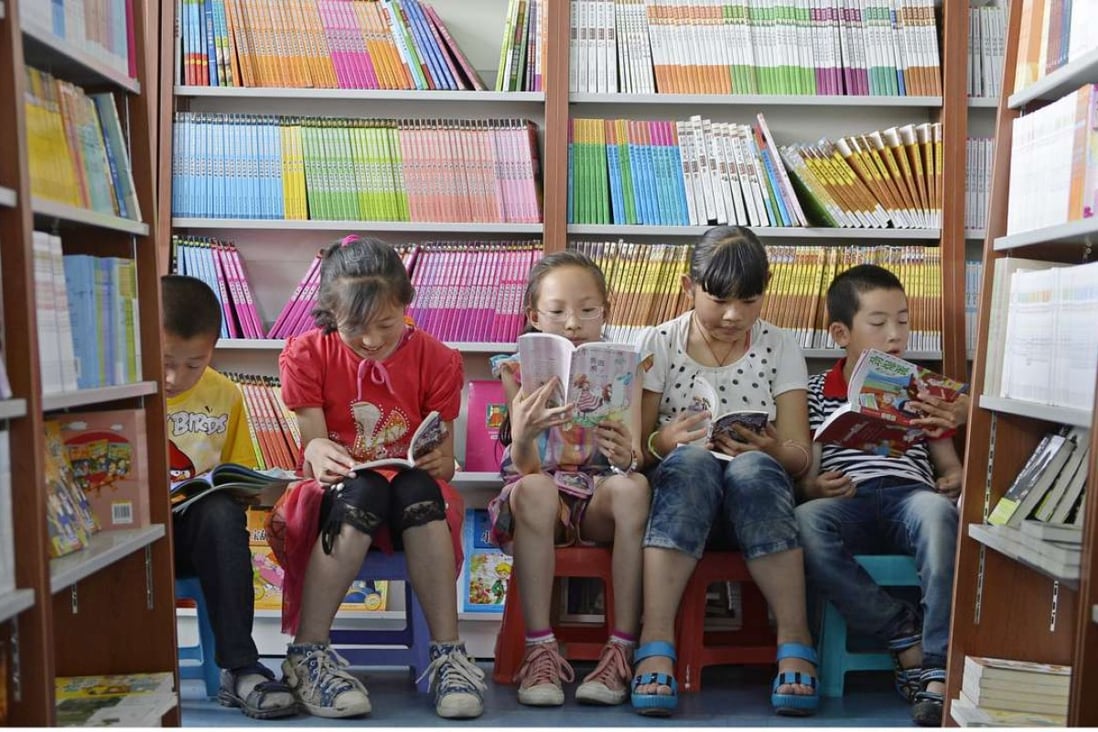 Children read books in a special reading area at the Yinchuan book centre in Yinchuan, Ningxia. Photo: Xinhua