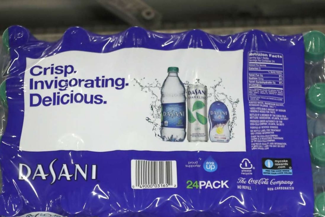 A case of Dasani bottled water moves down a production line at a Coco-Cola bottling plant in Utah. Photo: AFP