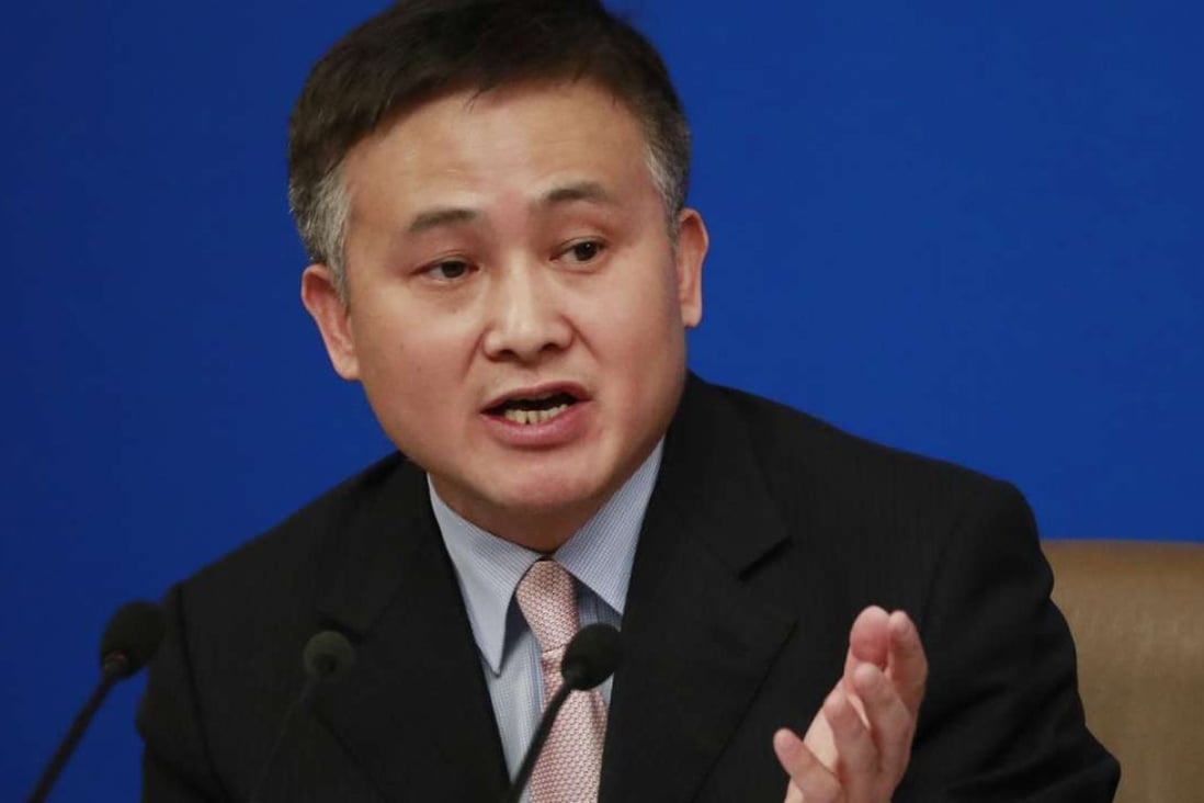 Central bank Deputy Governor Pan Gongsheng said Beijing supported qualified companies conducting “orderly, steadily” overseas investment. Photo: EPA