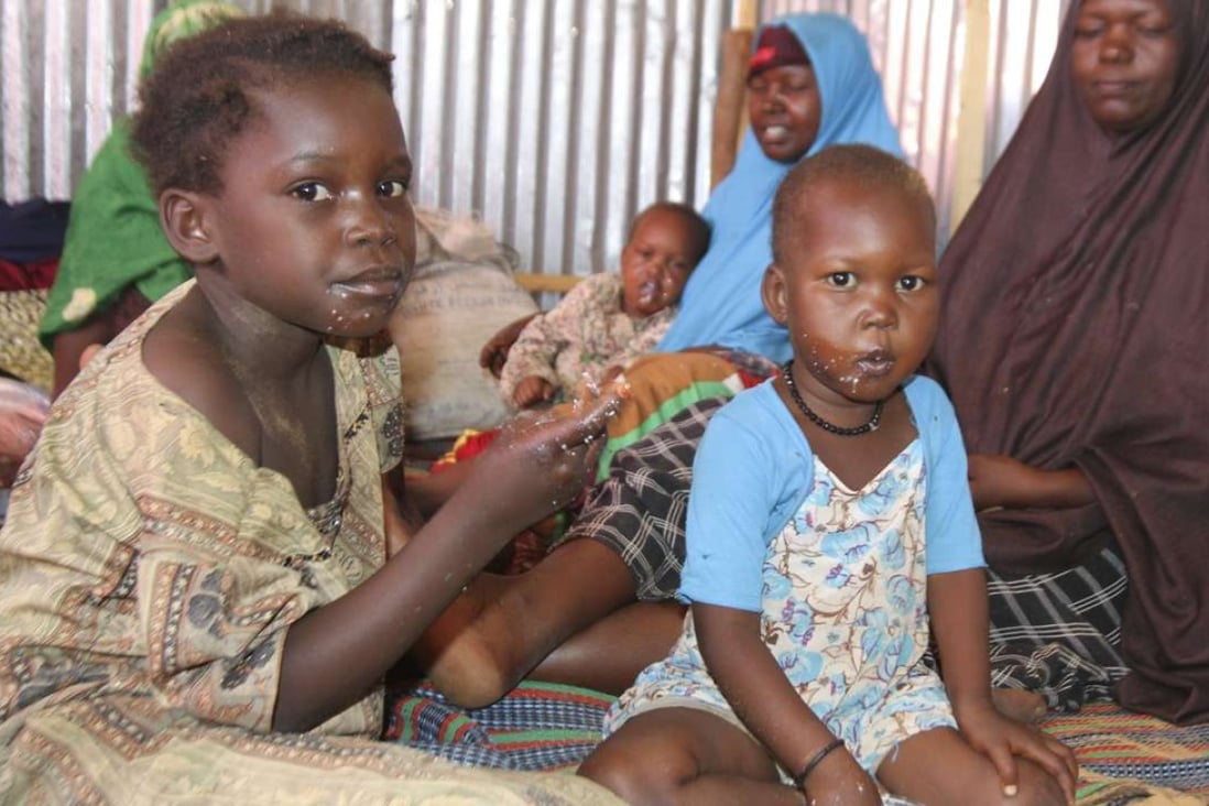 Internally displaced children at a relief camp on the outskirts of Somalia’s capital Mogadishu, on March 8. The World Health Organisation has warned that the country is on the edge of a full-blown famine, with more than 6 million people in need of food assistance. Photo: EPA