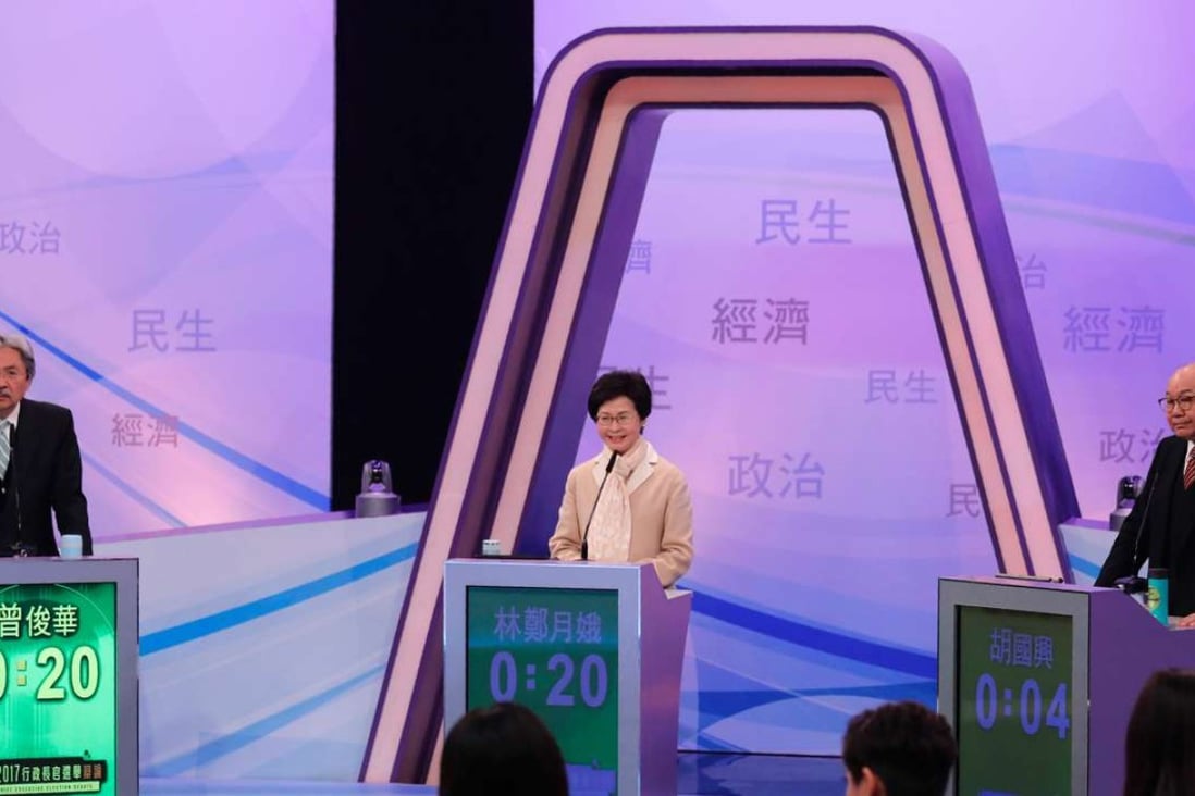 Hong Kong's three leadership candidates (L-R) John Tsang, Carrie Lam, and ex-judge Woo Kwok-hing attend the first televised debate at the TVB studio. Photo: AFP