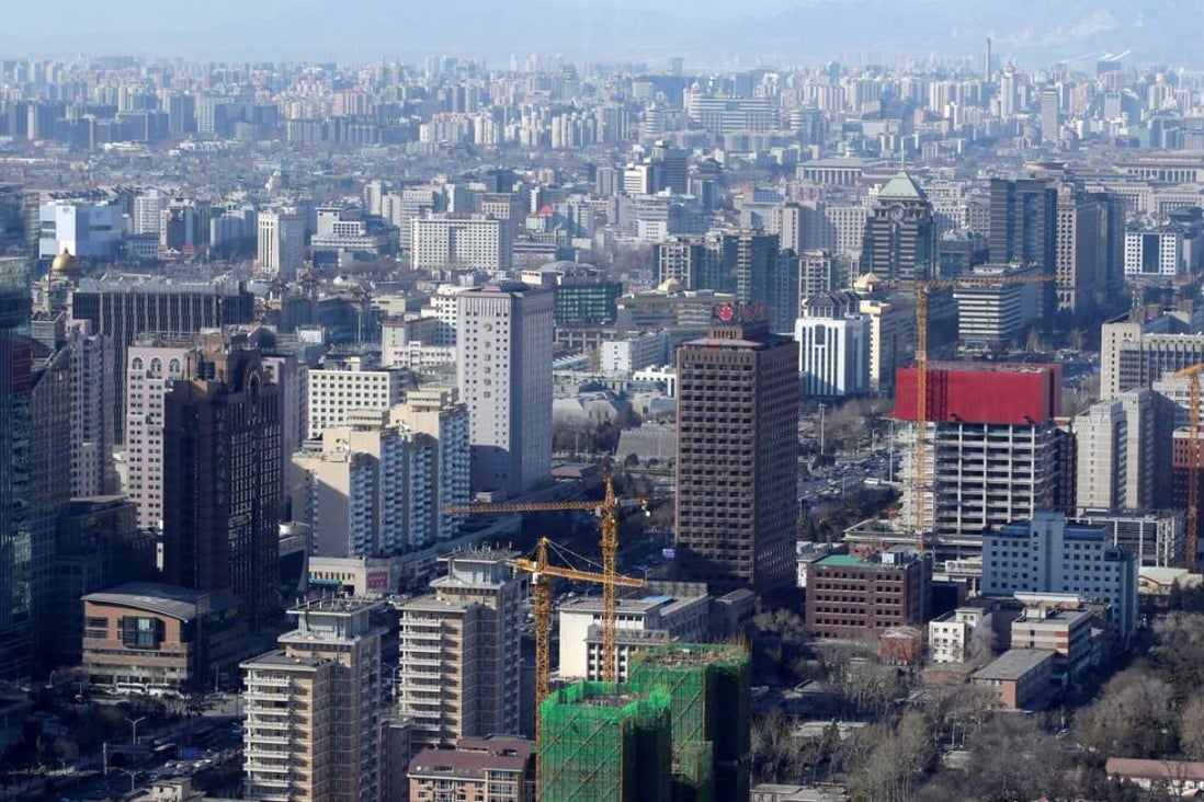 Residential and office buildings in Beijing. The municipal government has raised down payments for most property deals for second home purchases to an unprecedented 80 per cent. Photo: Reuters