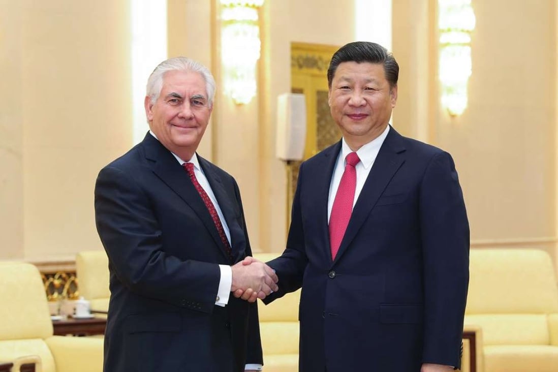 China's President Xi Jinping shakes hands with US Secretary of State Rex Tillerson before their meeting at the Great Hall of the People in Beijing. Photo: AFP