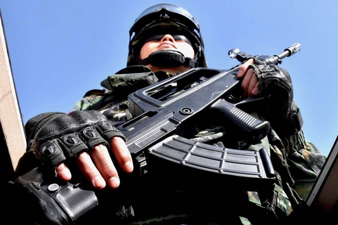 A Chinese military policeman in Xinjiang. Photo: AFP