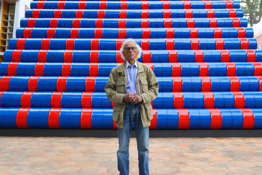Bulgarian artist Christo poses in front of his monumental Mastaba artwork at the Maeght Foundation in Saint-Paul-de-Vence, southeastern France, in 2016. He wants to build a far bigger one in the United Arab Emirates. Photo: AFP