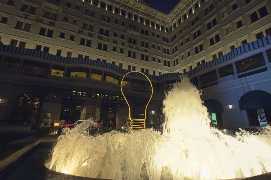 Bright Idea 2016, a giant light bulb in steel, appears to float atop The Peninsula hotel’s fountain. Photo: courtesy of The Peninsula