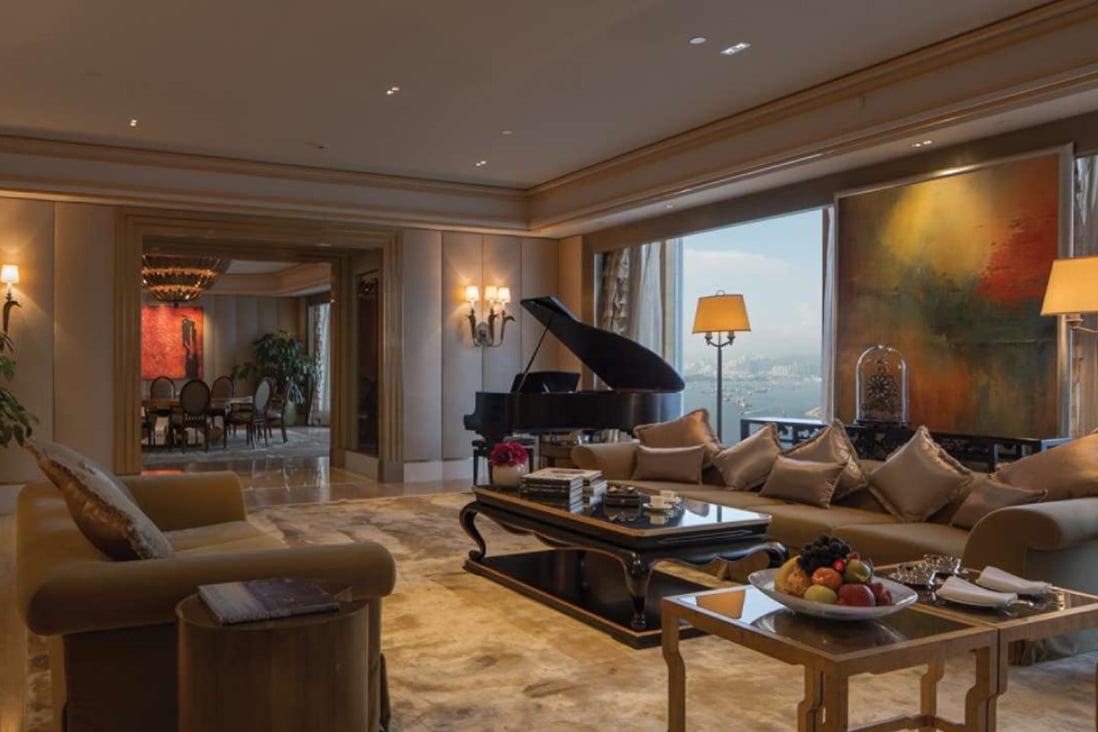 The Four Seasons Luxury Suite embodies opulence on the 117th floor of the Ritz-Carlton, Hong Kong.