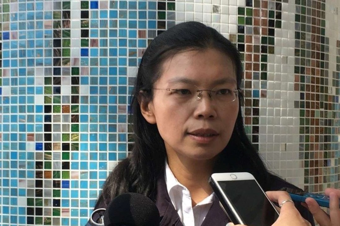 Lee Ching-yu, wife of Lee Ming-che, says her husband has been detained on the mainland. Photo: Handout