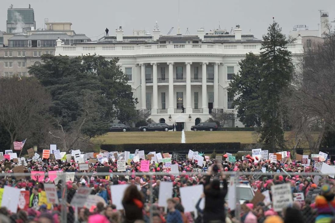 Demonstrators protest near the White House in Washington, DC, for the Women's March on January 21, 2017. Picture: AFP