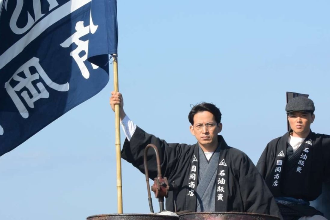 Junichi Okada (left) in Fueled: The Man They Called Pirate (category: IIA: Japanese, English), directed by Takashi Yamazaki.