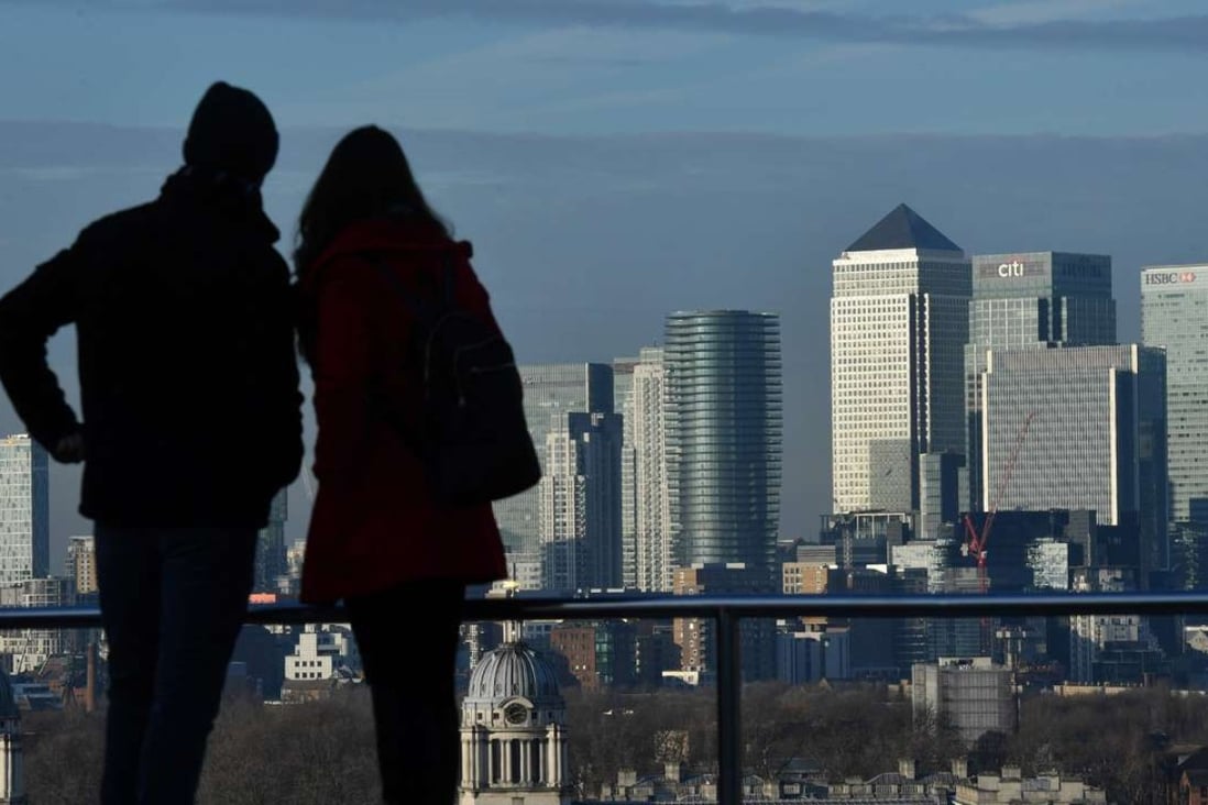 A view across London towards Canary Wharf, primarily a financial district, which is noted for being a socially integrated neighbourhood where people also live and play. Photo: AFP