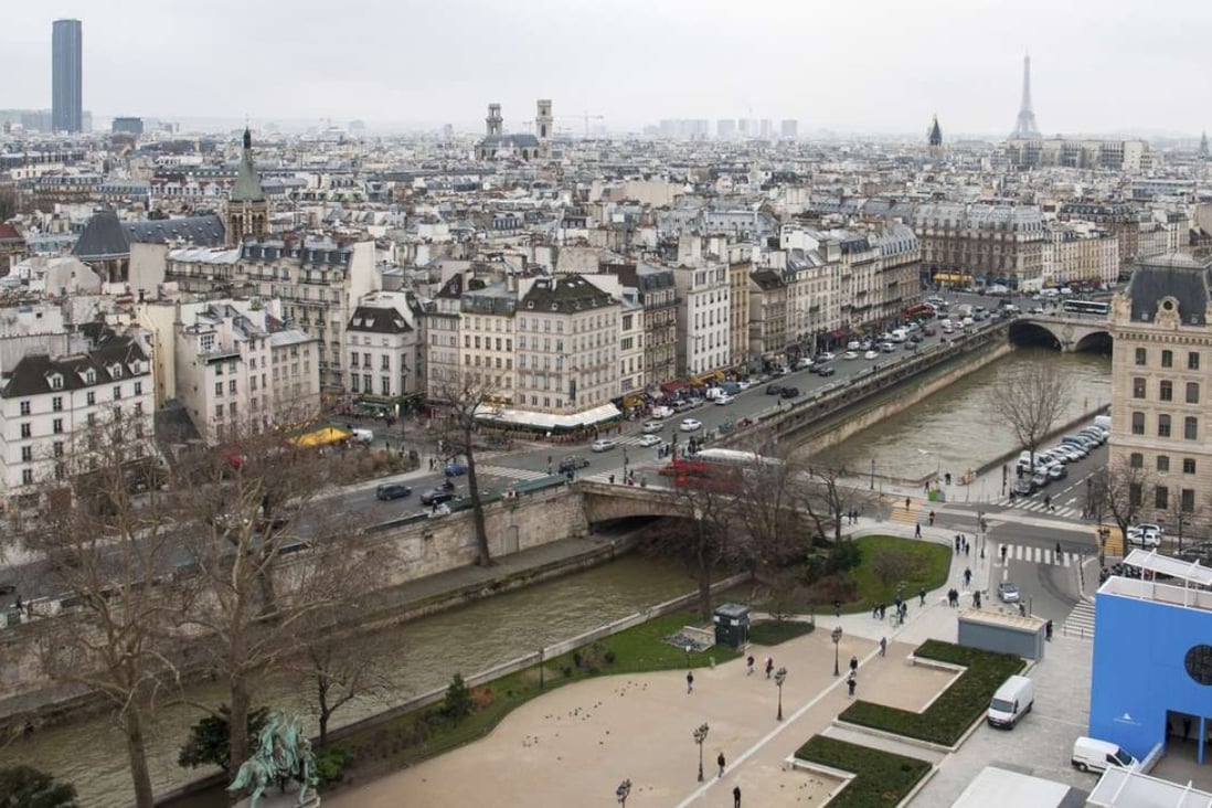 The Montparnasse tour, in the distance on the left, and the Eiffel Tower, to the right, are among only a handful of Parisian structures to rise above seven storeys. Photo: Alamy