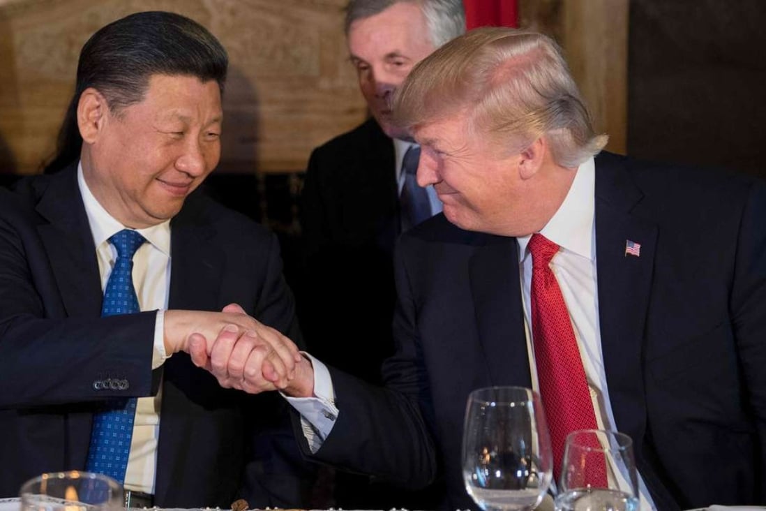 Chinese President Xi Jinping shake hands with US President Donald Trump during dinner at the Mar-a-Lago estate in Florida on Thursday. Photo: AFP