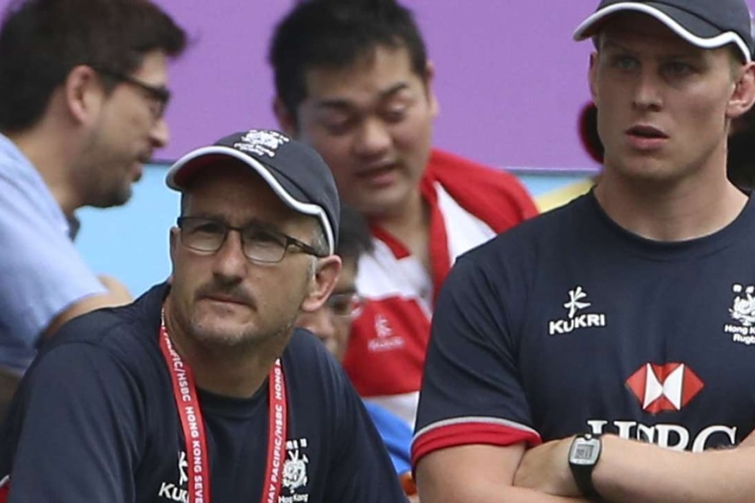 Hong Kong head coach Paul John and assistant Jevon Groves watch it all unravel against Chile yesterday. Photo: Jonathan Wong