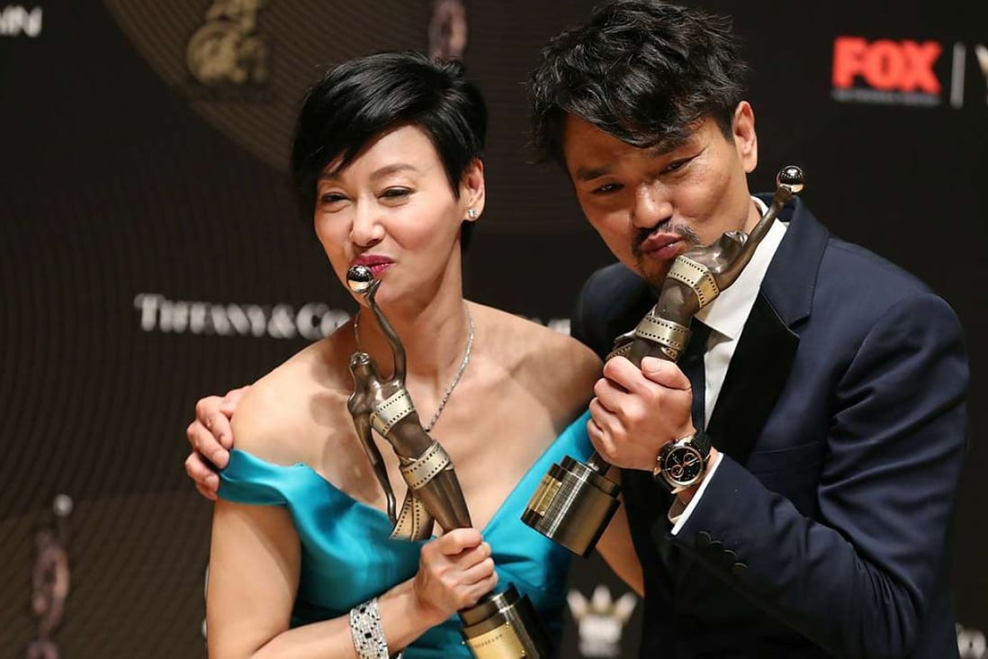 Best Actress Kara Wai (left) and Best Actor Lam Ka-tung share the spotlight at the Film Awards. Photo: Edward Wong