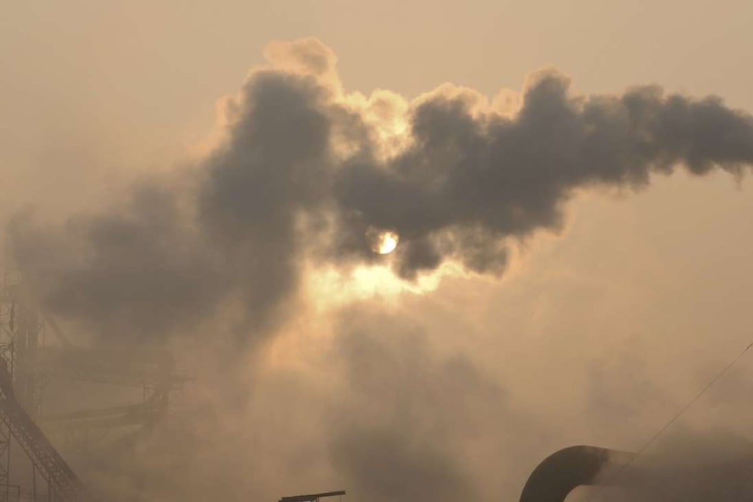 A file picture of smoke belching out of a cement plant in Shandong province. Photo: AP