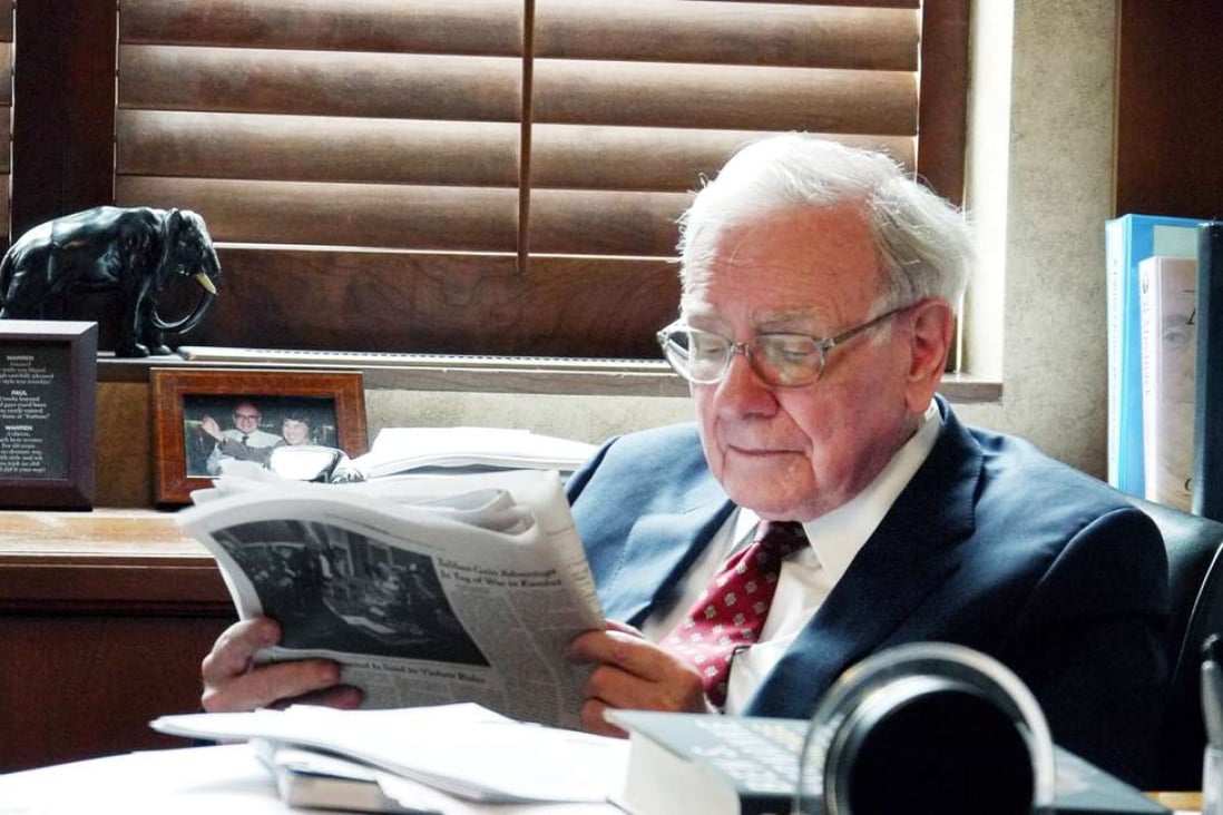 Warren Buffett at his desk in a documentary. His Berkshire Hathaway HomeServices entered into a marketing agreement with Juwai.com, China’s largest international property website. Photo: HBO