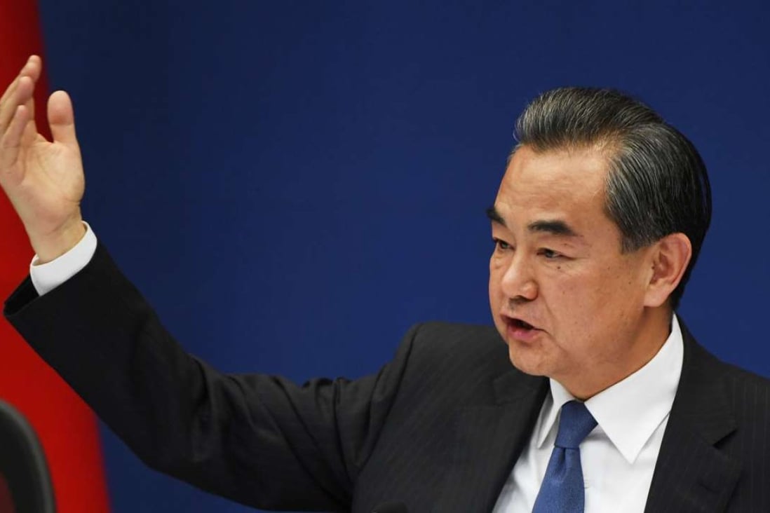 Foreign minister Wang Yi speaks at a press conference at the Ministry of Foreign Affairs in Beijing on Tuesday. Photo: AFP