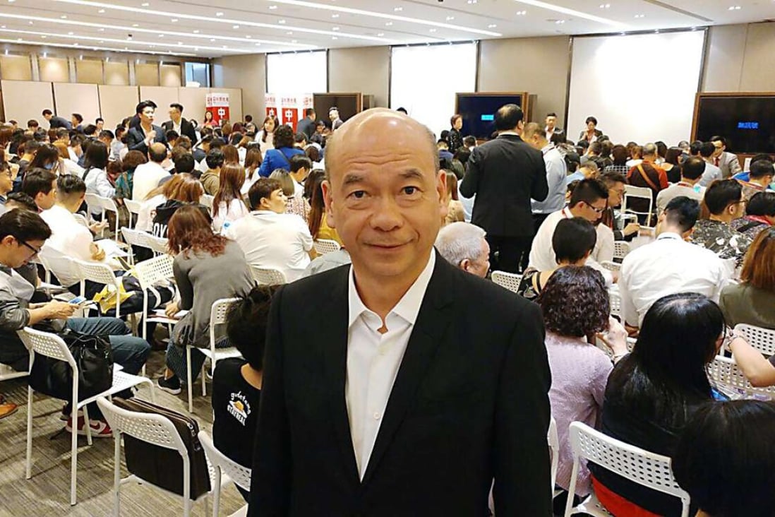 Louis Chan, Centaline Property Agency's Asia Pacific vice chairman, at the sales office for the Eight Regency project. Photo: Handout