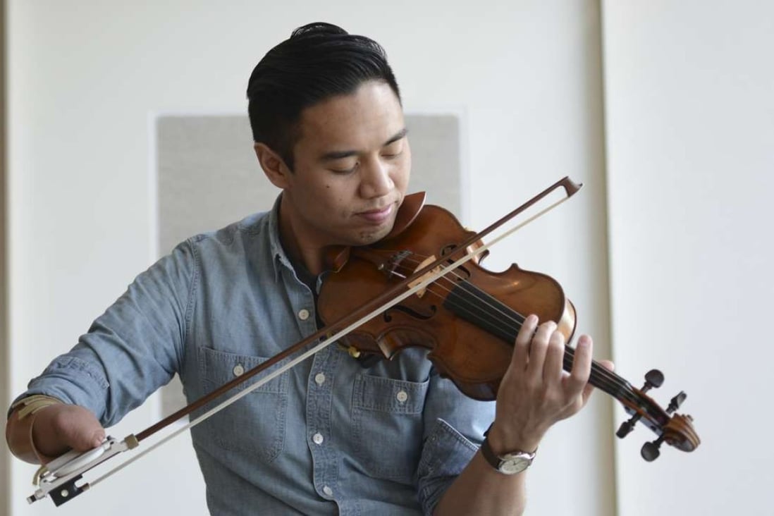 Disability shifts when you give people the right tools to overcome challenges, says Thai-Chinese violinist Adrian Anantawan, who was born without fingers on his right hand. Picture: Antony Dickson