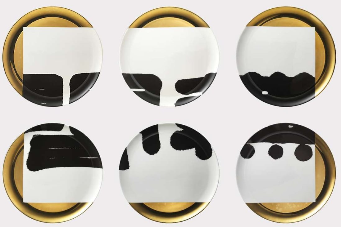 Designer-artist Freeman Lau’s gold and white ceramic plates, decorated in bold ink brushstrokes, are part of a long-term collaboration with master calligrapher Tong Yang-tse from Taiwan.