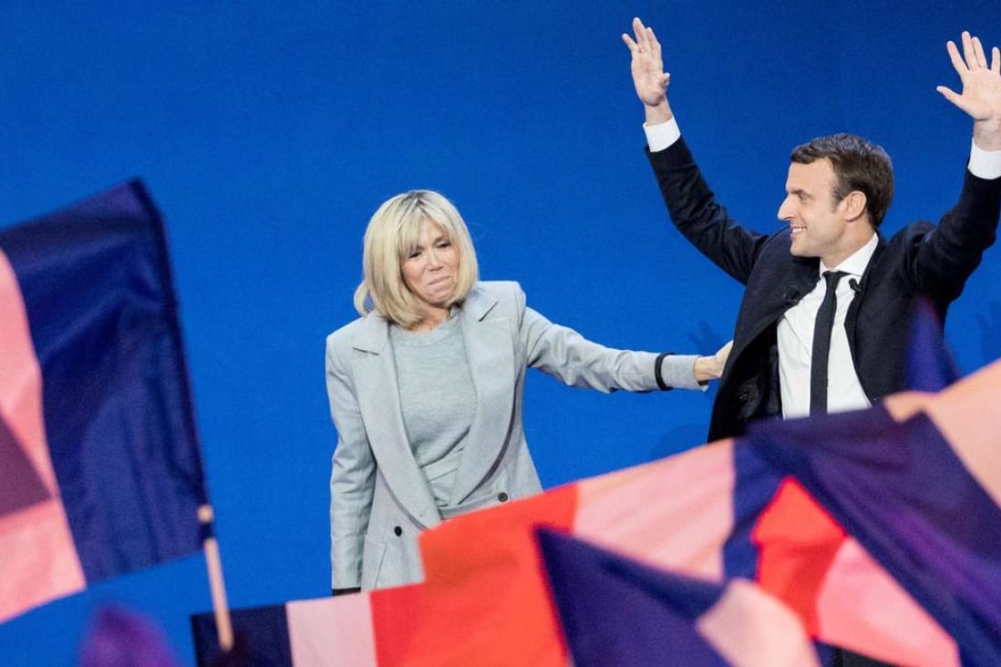 Emmanuel Macron and his wife Brigitte pictured during an election rally on Sunday. Photo: Bloomberg