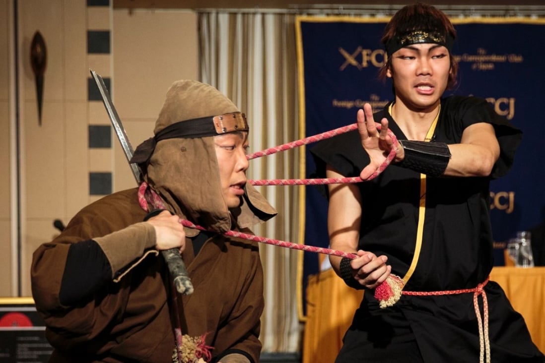 Members of ninja group Ashura show their martial art skills. Photo: AFP
