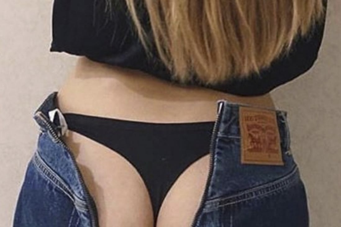 The butt-revealing “reworked” jeans have zippers on the front, back and all the way up the leg. Your best bet is to look for them online