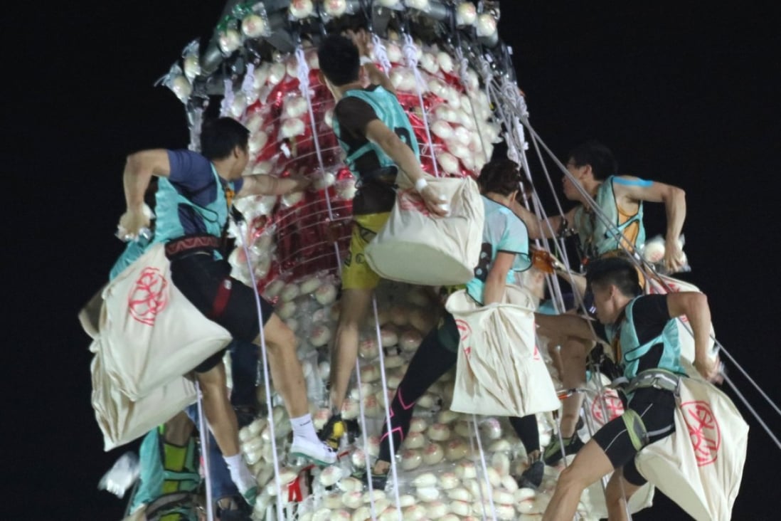 Hong Kong bun festival race in Cheung Chau crowns repeat champions