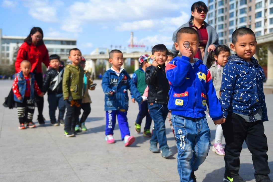 Children stroll in Wuyi Square in the city of Ulanhot, in China’s Inner Mongolia autonomous region. China, which now has the world’s second-largest economy, was once the ADB’s second-largest sovereign borrower. Photo: Xinhua