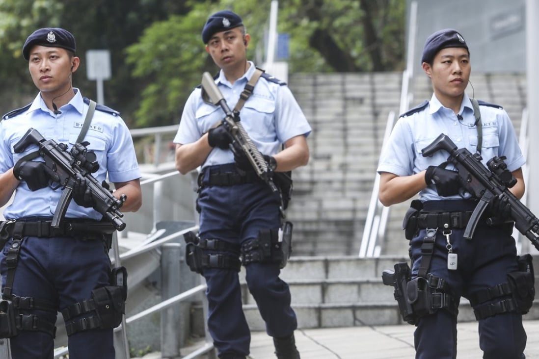 Armed police patrol the streets of Hong Kong. Photo: Sam Tsang