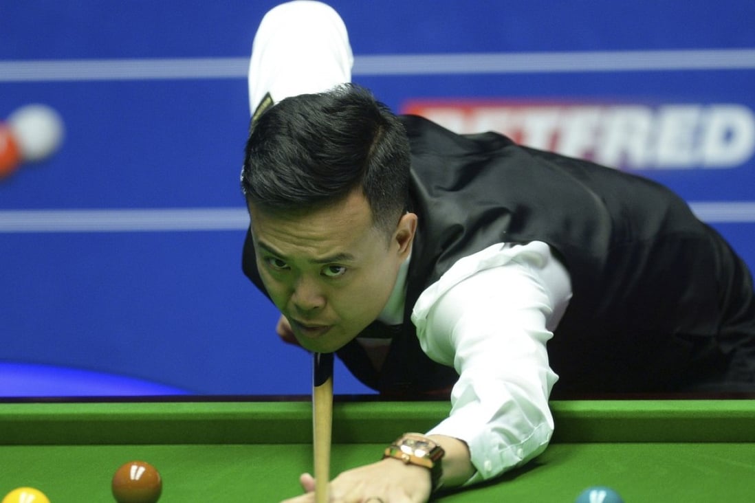 Hong Kong’s Marco Fu in action during his second-round victory against Australia’s Neil Robertson. Photo: AP