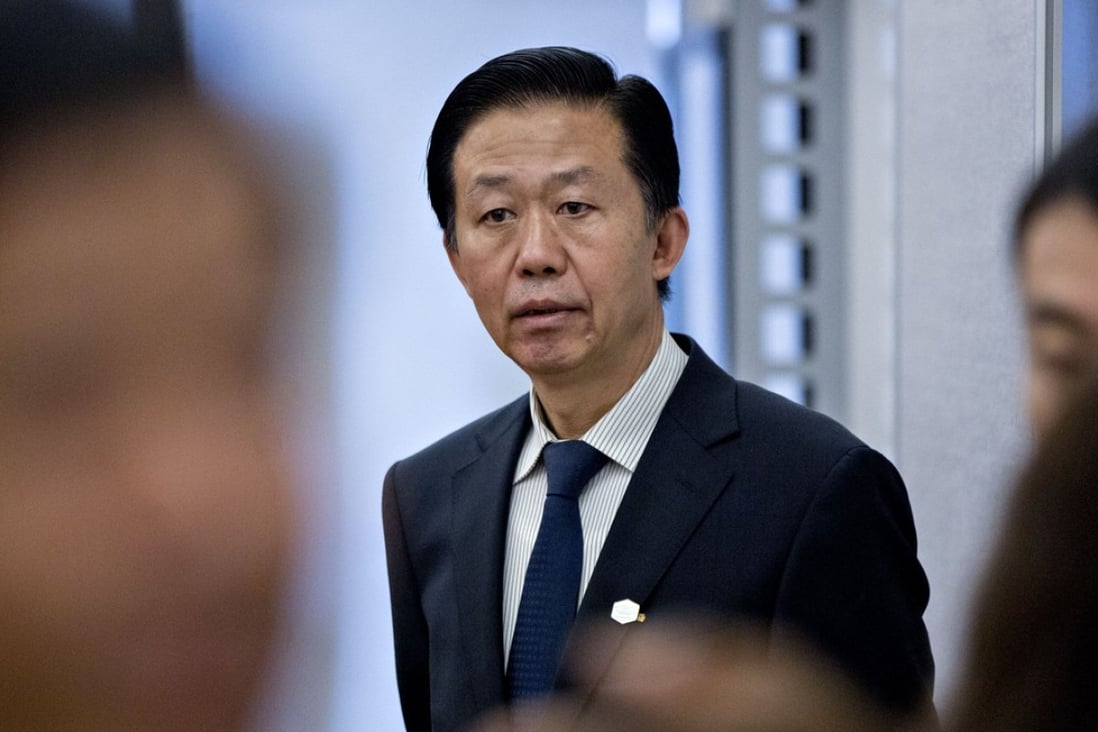 China's finance minister Xiao Jie, pictured last month in Washington, was absent from bilateral meeting with his Japanese and South Korean counterparts in Yokohama on Friday. Photo: Bloomber
