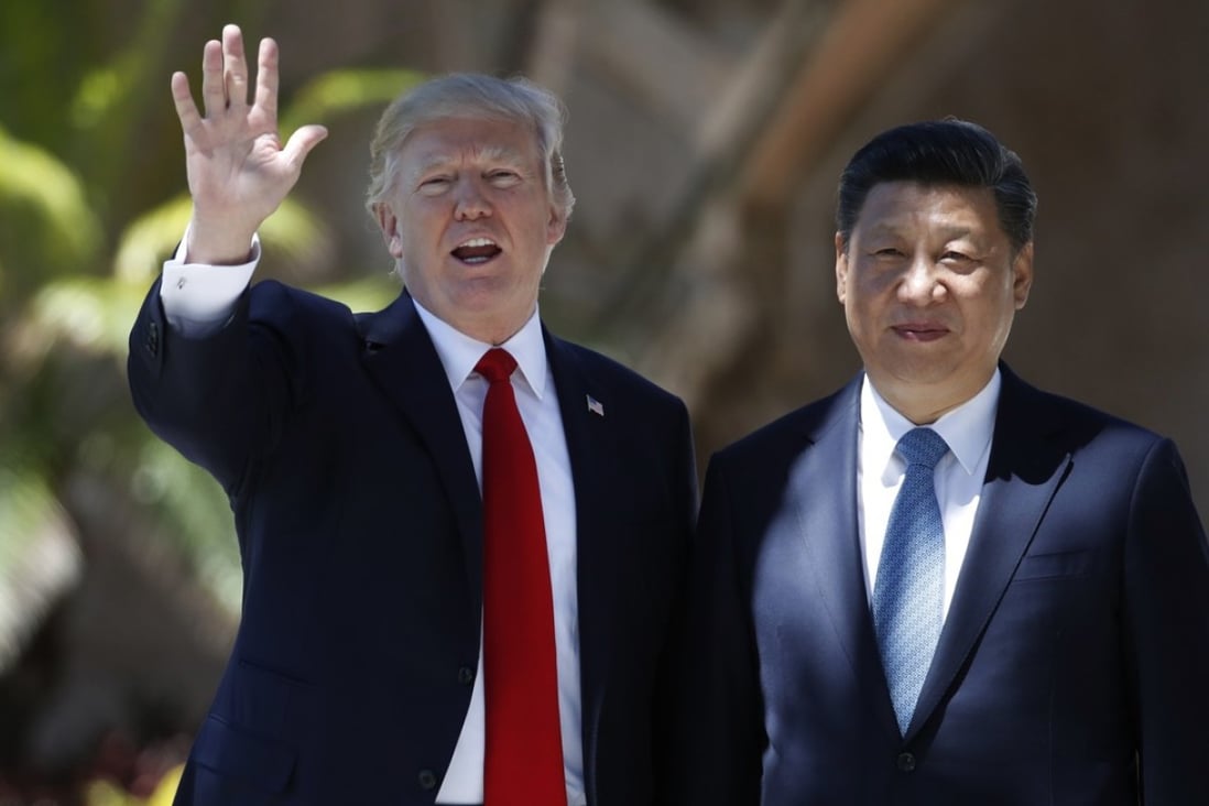 US President Donald Trump and Chinese President Xi Jinping pause for photographs at Trump’s Mar-a-Lago estate in Palm Beach, Florida, in file photo from April 7, 2017. Photo: AP