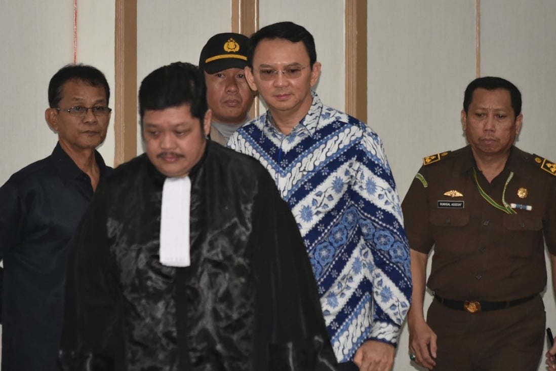 Jakarta’s Christian governor Basuki Purnama, popularly known as Ahok, arrives at a court in Jakarta for his verdict and sentence. Photo: AFP