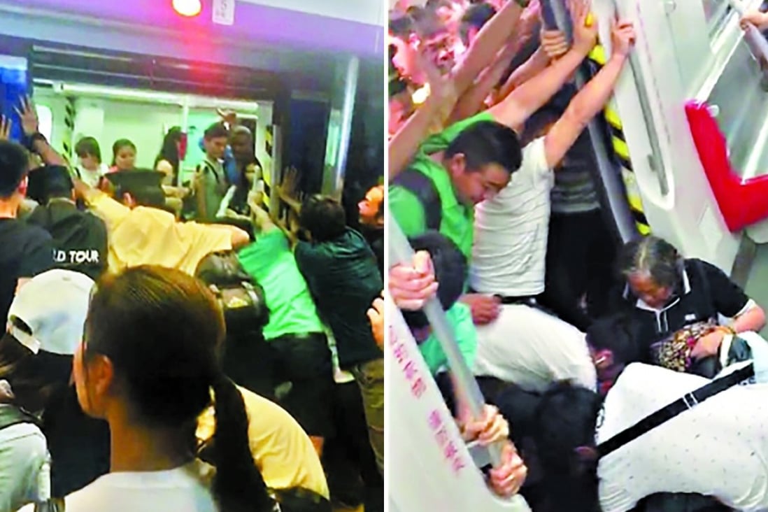 Commuters united to free the woman whose leg got trapped in between a subway train carriage and the platform in Guangzhou. Photo: Handout