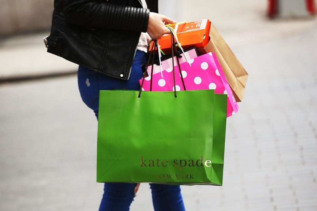 Coach, the American maker of high-end luxury goods, announced on Monday that it would buy rival Kate Spade in a US$2.4 billion deal. Photo: AFP