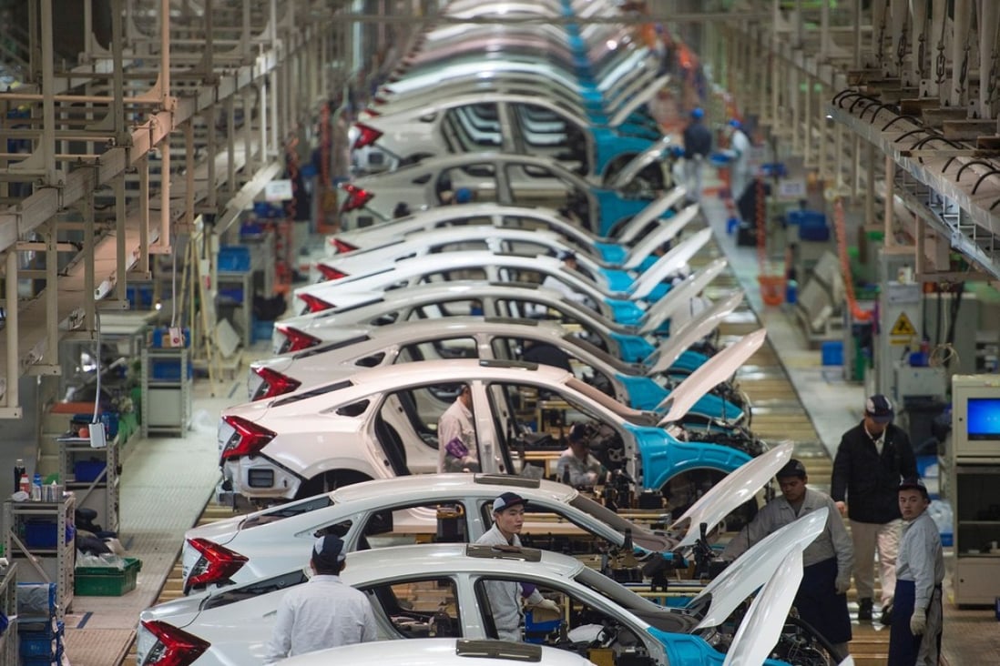 A file picture of a car factory in Hubei province. Photo: AFP