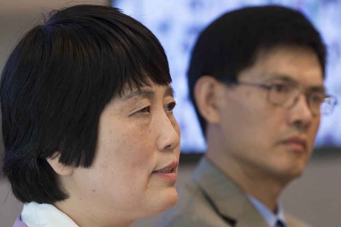 Sherry Chen (left), a US federal government worker, and Xiaoxing Xi, chair of the Physics Department at Temple University, speak about charges against them of spying for China, which were dropped, at a press conference in Washington on September 15, 2015. Photo: AFP