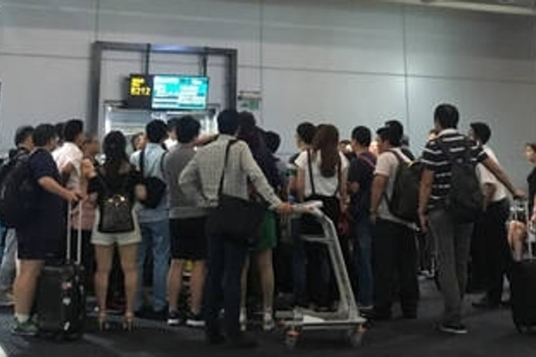 More than 10,000 travellers were left stranded after flight operations were disrupted by drones at the international airport in Chongqing on Friday night. Photo: Handout
