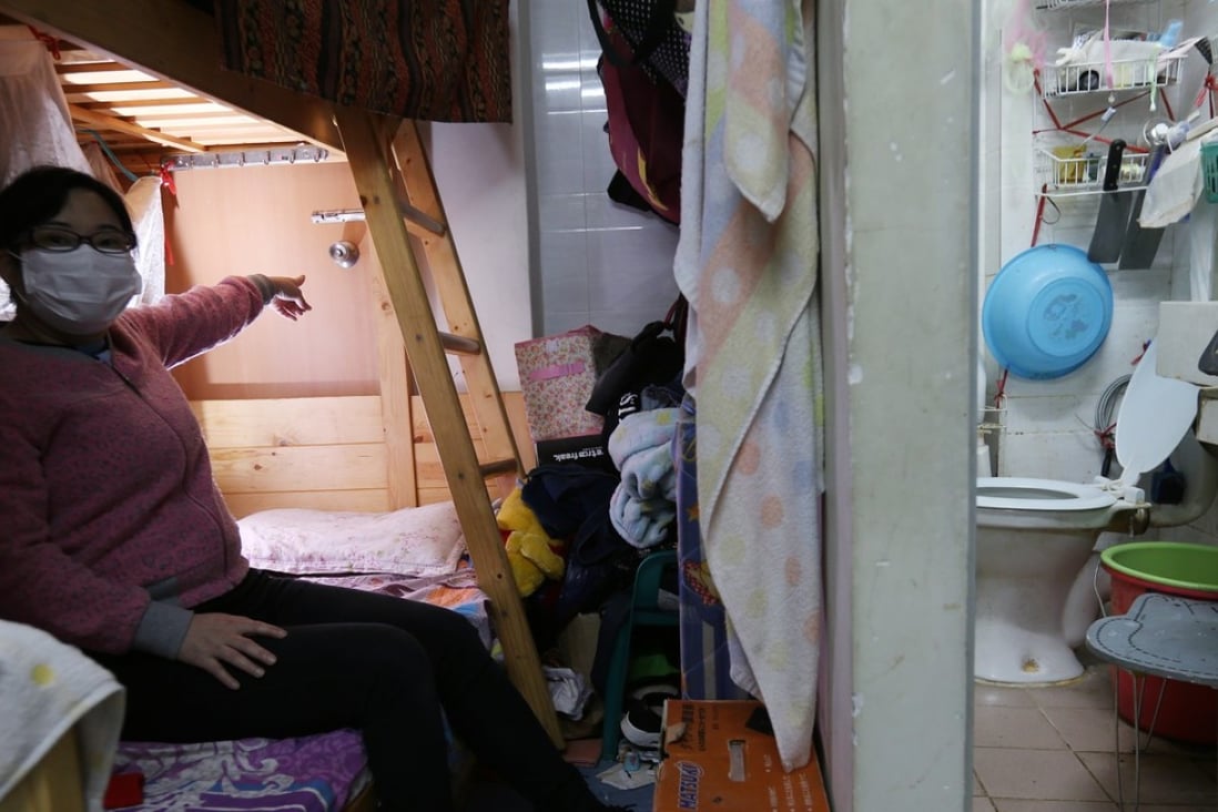 Ms Wu, pictured, and her husband and daughter escaped through a back door hidden behind their bed. They had never opened the door in the 11 years they had lived there, and did not even know if it opened. Photo: Dickson Lee