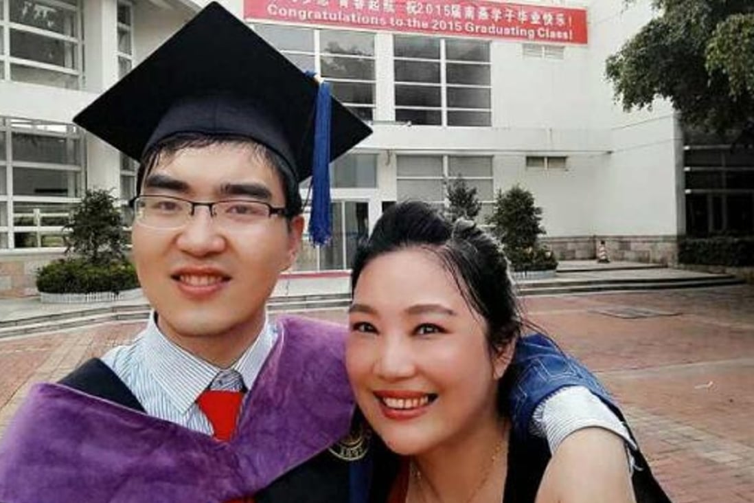 Ding Ding with his mother Zuo Hongyan at his master’s degree graduation at Peking University in 2015. Photo: Handout