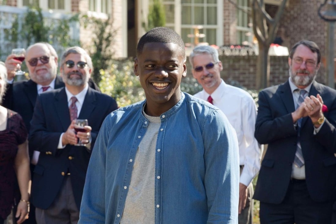 Daniel Kaluuya (centre) in Get Out (category: IIB), directed by Jordan Peele. The film also stars Alison Williams.