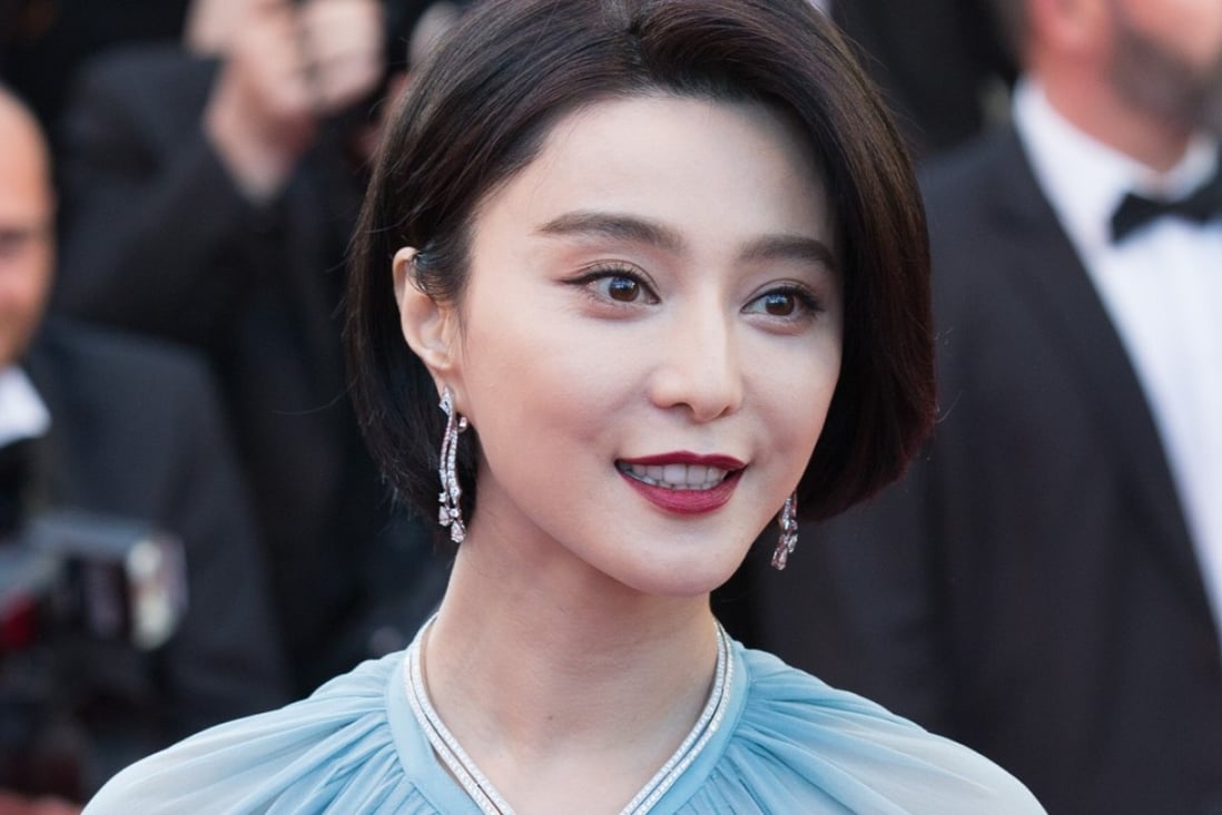 Jury member for the 70th Cannes International Film Festival Fan Bingbing Wang Luodan poses on the red carpet at the opening of the 70th Cannes International Film Festival. Photo: Xinhua