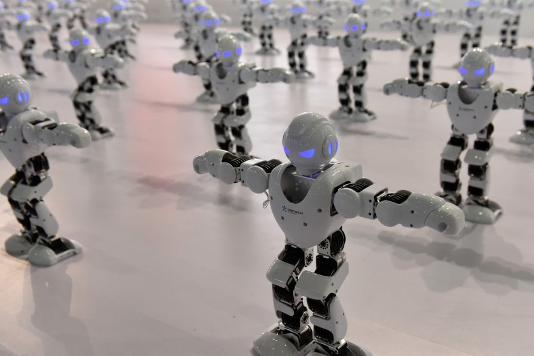 Robots dance at the 4th China Information Technology Expo in Shenzhen in April last year. Photo: Xinhua