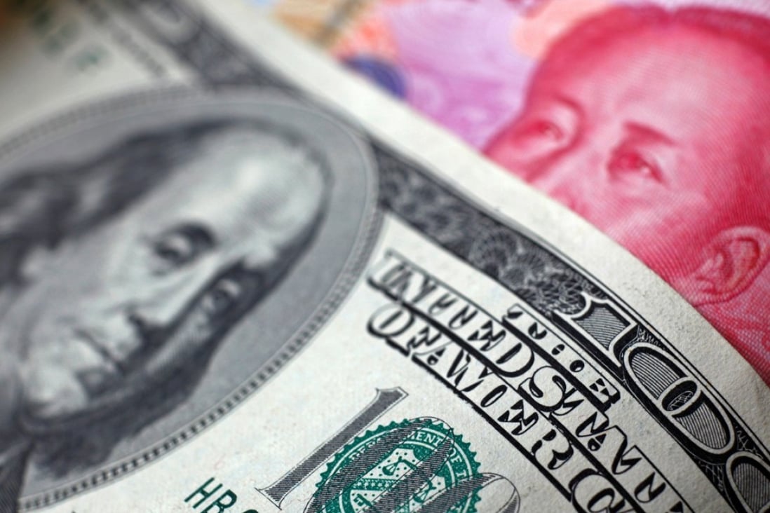 The yuan weakens against the US dollar Tuesday morning. Photo: Reuters